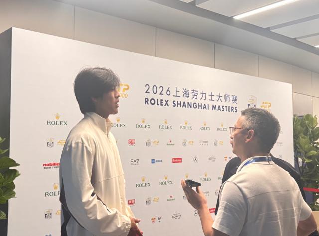 张奔斗:能打出前50网球的周意,为何排名还在277